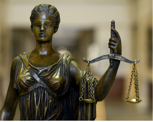 Justice figure with scales